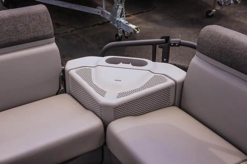 Slide: The Image of 2026 Sea-Doo Switch Cruise 21 interior seating with integrated storage and cup holder. - 20