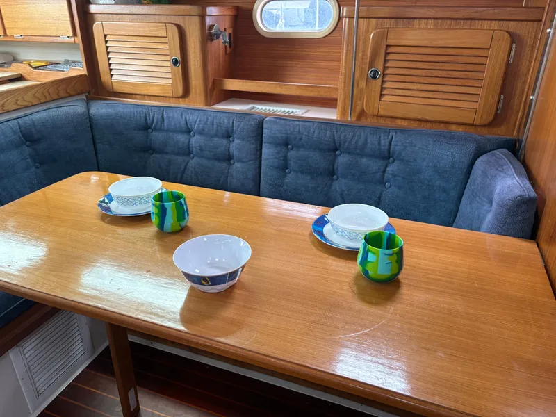 Slide: The Image of Interior of Catalina 36 MkII yacht, dining area with tableware. - 17