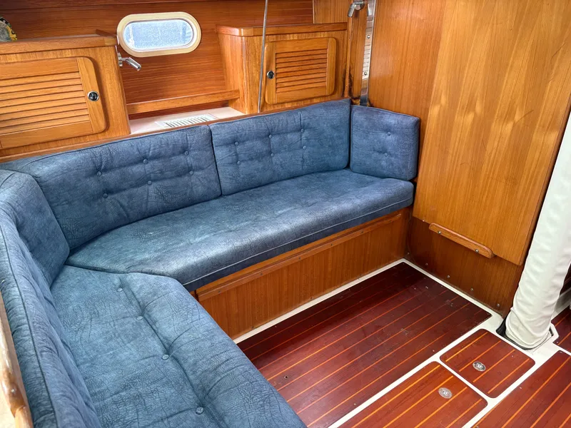 Slide: The Image of Interior of a 2000 Catalina 36 MkII yacht with blue upholstery. - 18