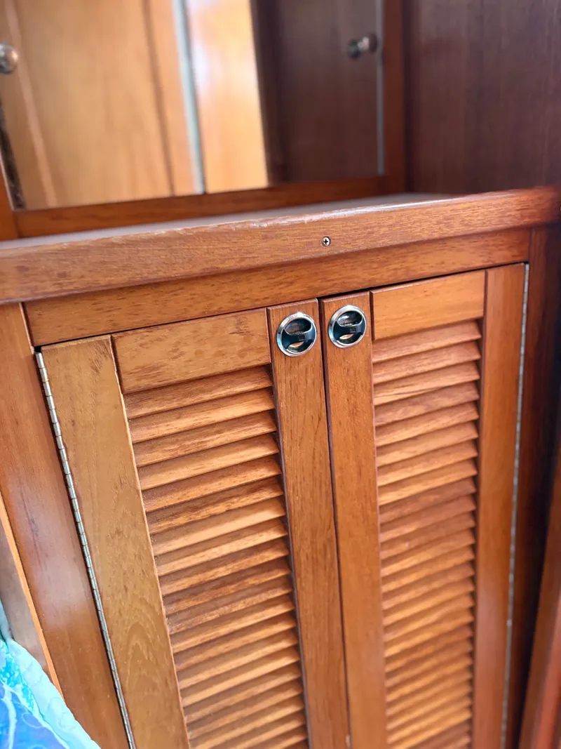 Slide: The Image of Wooden cabinet door on Catalina 36 MkII sailboat, year 2000. - 28