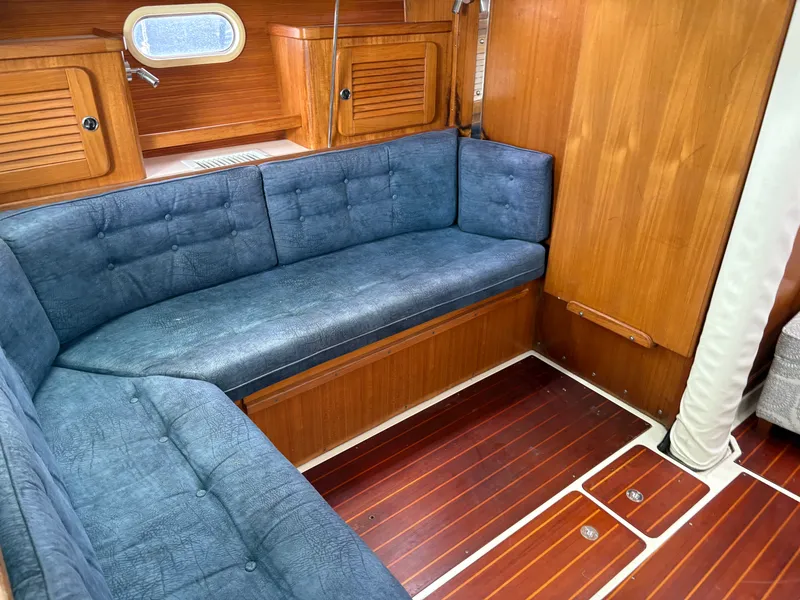 Slide: The Image of Interior of a 2000 Catalina 36 MkII yacht with blue upholstery. - 29