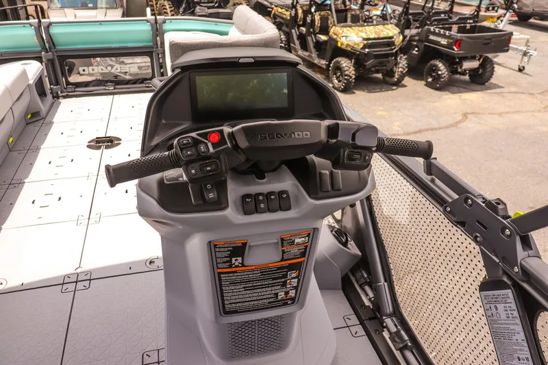 Slide: The Image of 2026 Sea-Doo Switch Cruise 21 dashboard with steering controls and display screen. - 14