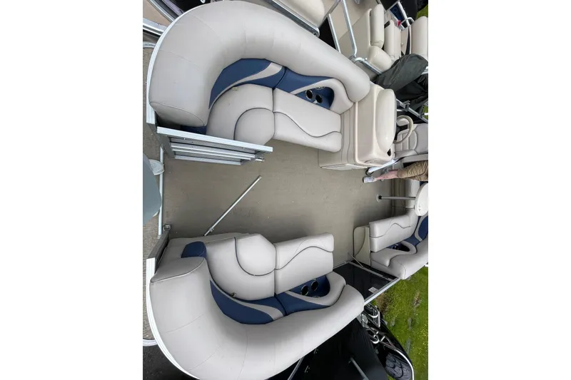 Slide: The Image of 2010 Harris FloteBote 200 Cruiser CX pontoon boat interior with plush seating. - 8