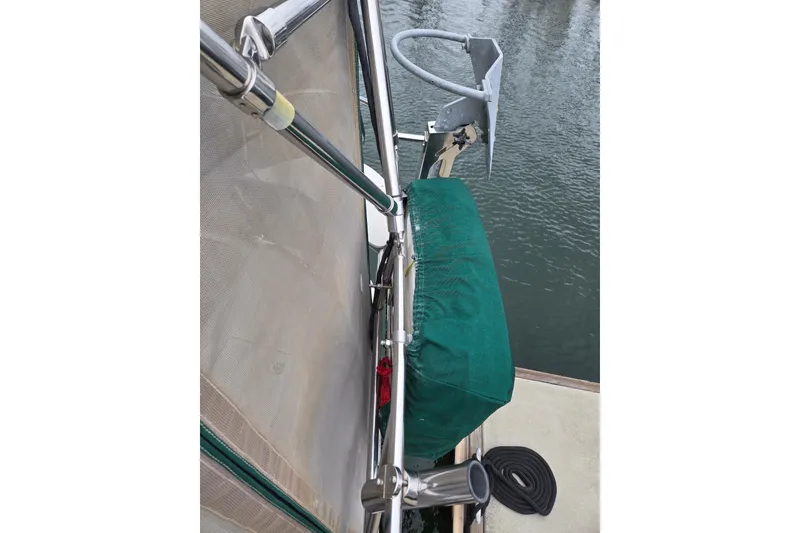 Slide: The Image of Sailboat deck view with green cover, Catalina 380, 1999 model. - 20