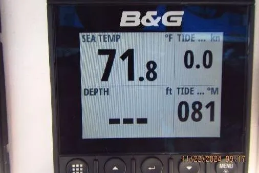 Slide: The Image of B&G marine display showing sea temperature and tide data on Catalina 380, 1999 model. - 55