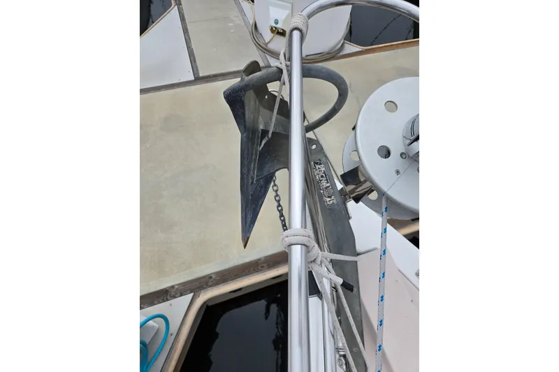 Slide: The Image of Anchor and winch system on a 1999 Catalina 380 sailboat deck. - 9