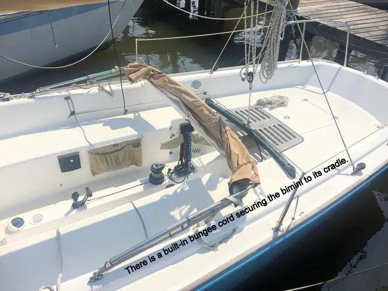 Slide: The Image of 2008 e Sailing Yachts e33 with secured bimini in harbor. - 12