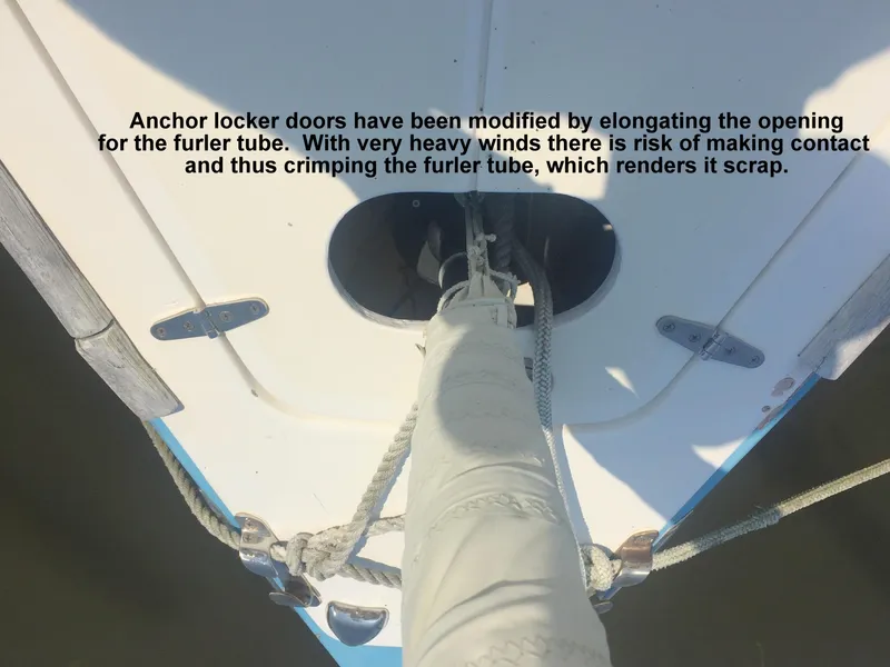 Slide: The Image of 2008 e33 sailing yacht with modified anchor locker doors and furler tube. - 13