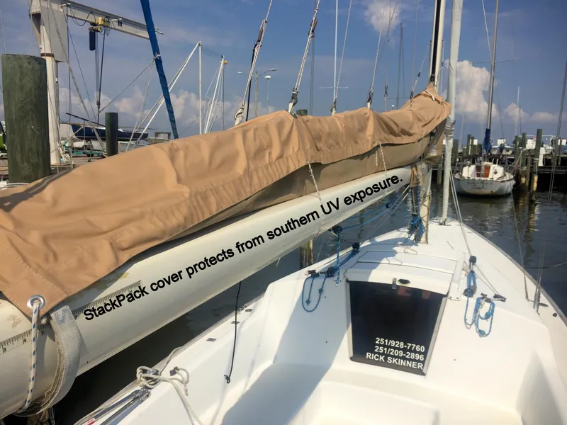 Slide: The Image of 2008 e33 sailing yacht with StackPack cover in harbor. - 16