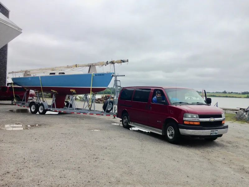 Slide: The Image of Red van towing e33 sailing yacht on trailer, 2008 model. - 22