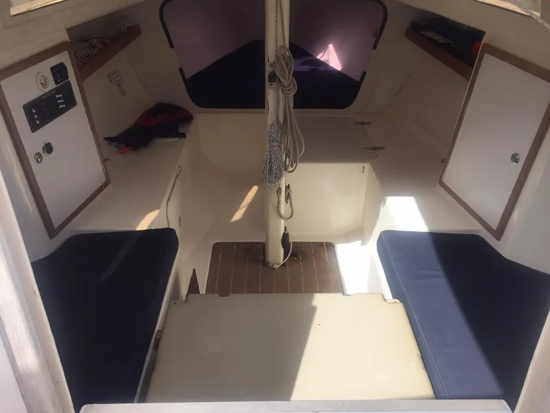 Slide: The Image of Interior of a 2008 e33 sailing yacht with blue cushions. - 32
