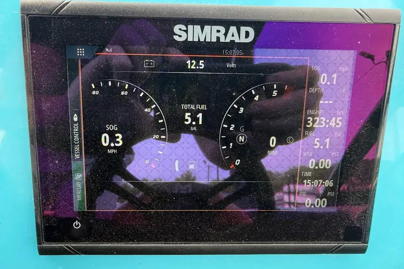 Slide: The Image of Simrad display on 2022 Heyday WT-2DC showing speed, fuel, and engine data. - 15
