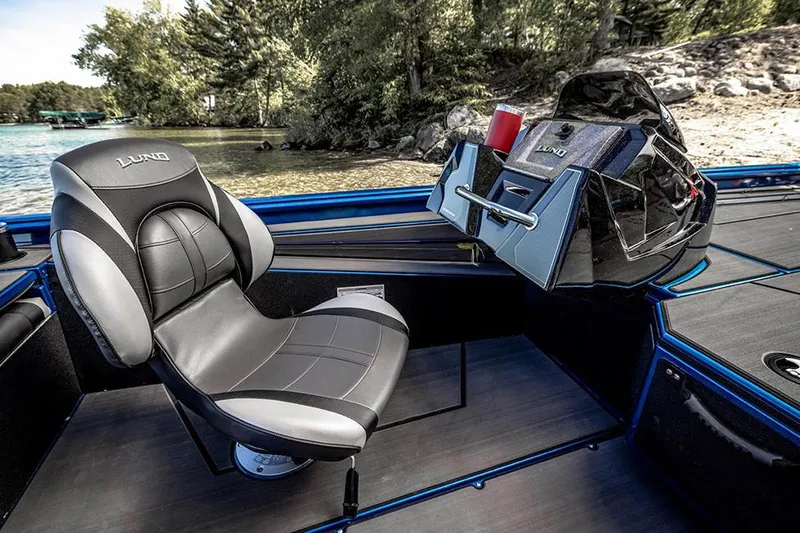 Slide: The Image of Manufacturer Provided Image: 2025 Lund 1975 Renegade boat interior with sleek seating and modern console design. - 20