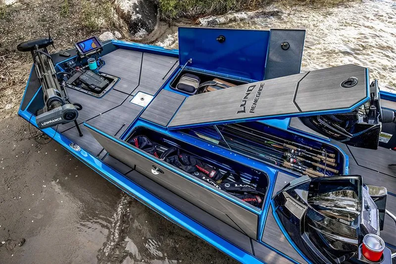 Slide: The Image of Manufacturer Provided Image: 2025 Lund 1975 Renegade boat with open storage compartments and fishing gear. - 21