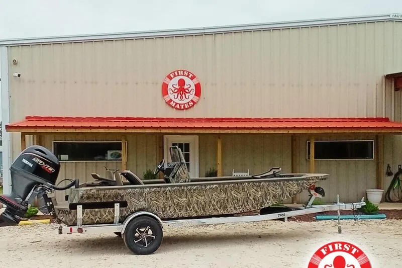 The Image of 2027 Thor 1900 Bay Hammer boat on trailer outside First Mates building. - 28