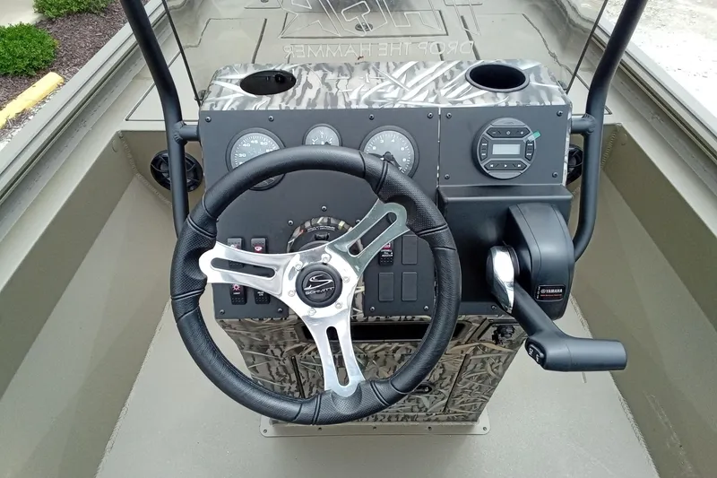 Slide: The Image of Steering console of 2027 Thor 1900 Bay Hammer boat with modern controls and gauges. - 42