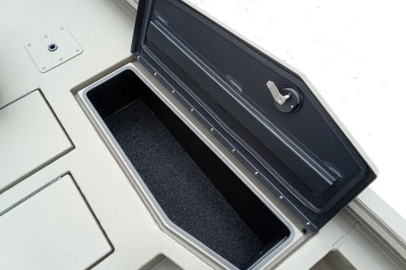 Slide: The Image of Open storage compartment on 2027 Thor 1900 Bay Hammer boat. - 44