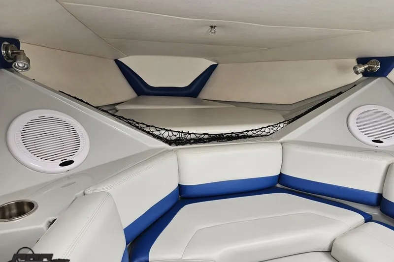Slide: The Image of Interior of 2006 Baja 35 Outlaw boat with blue and white seating. - 71