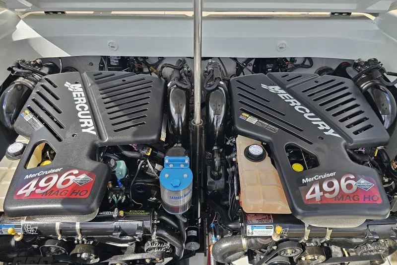 Slide: The Image of Twin Mercury MerCruiser 496 MAG HO engines in a 2006 Baja 35 Outlaw boat. - 82