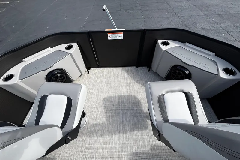 Slide: The Image of Interior of 2026 Princecraft Sportfisher 21-2S boat with seating and storage compartments. - 11