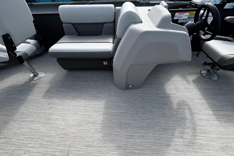 Slide: The Image of Interior of 2026 Princecraft Sportfisher 21-2S boat with modern seating and steering console. - 8