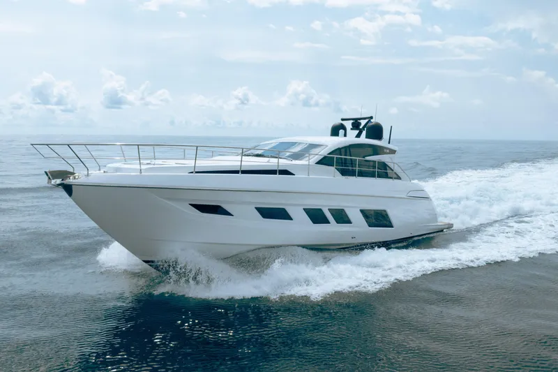 Slide: The Image of 2019 Filippetti S55 yacht cruising on open sea under clear skies. - 0