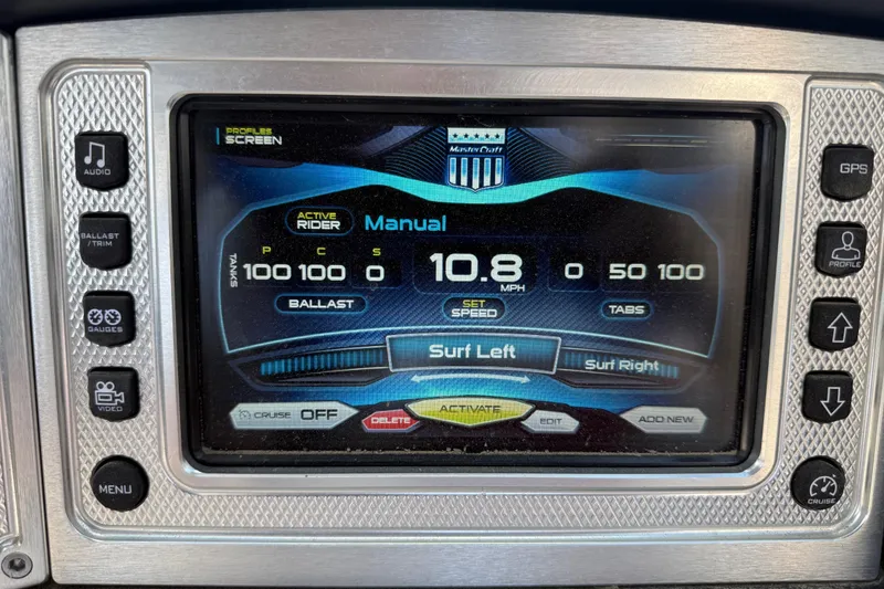 Slide: The Image of MasterCraft X-45 2013 dashboard display showing speed, ballast, and surf settings. - 10