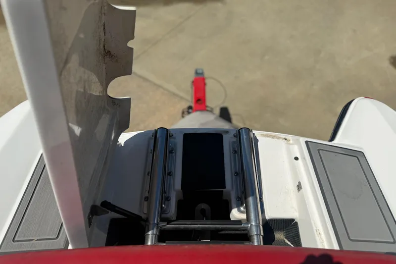 Slide: The Image of 2013 MasterCraft X-45 boat detail showing rear platform and metal fittings. - 3
