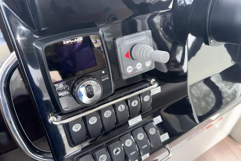Slide: The Image of Control panel of 2022 Jeanneau NC Weekender 1095 boat with Zipwake and Side-Power systems. - 13