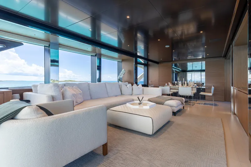 Slide: The Image of Luxurious interior of 2020 Riva 90 Argo yacht with elegant seating and ocean views. - 17