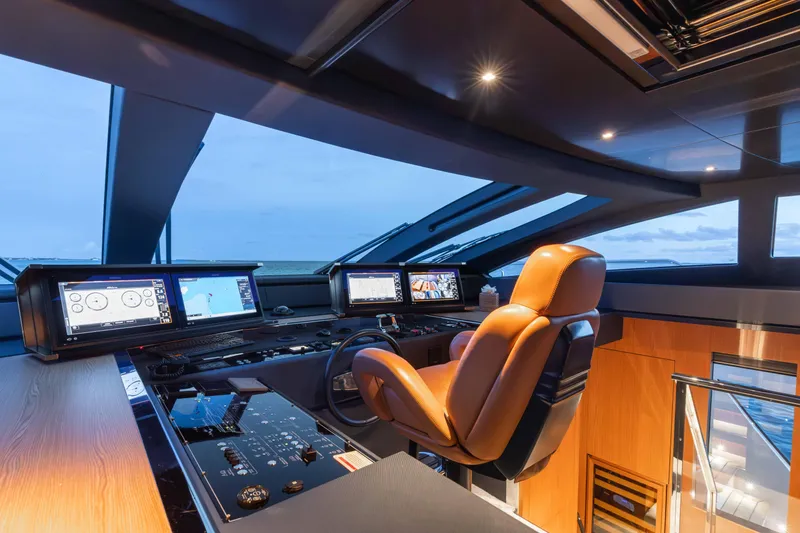 Slide: The Image of Luxurious 2020 Riva 90 Argo yacht cockpit with modern navigation systems and leather seating. - 42