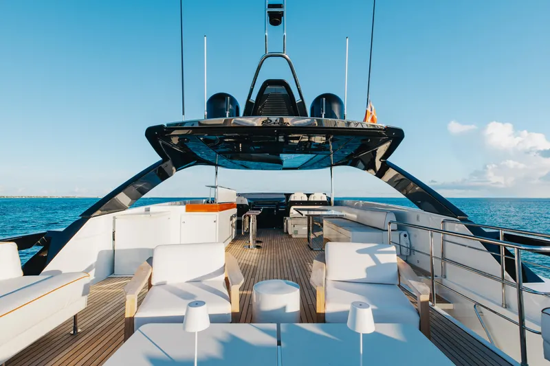Slide: The Image of Luxurious 2020 Riva 90 Argo yacht deck with modern seating and ocean view. - 48