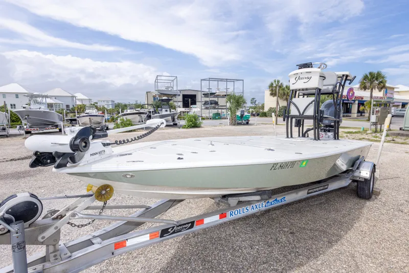 Slide: The Image of 2012 Young GulfShore 20 boat on trailer in marina setting. - 20