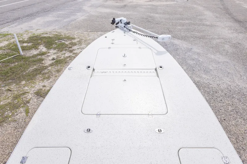 Slide: The Image of 2012 Young GulfShore 20 boat deck with storage hatches and trolling motor. - 25