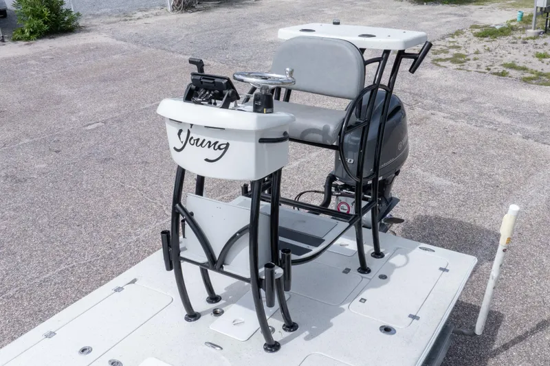 Slide: The Image of 2012 Young GulfShore 20 boat with steering console and Yamaha engine. - 28