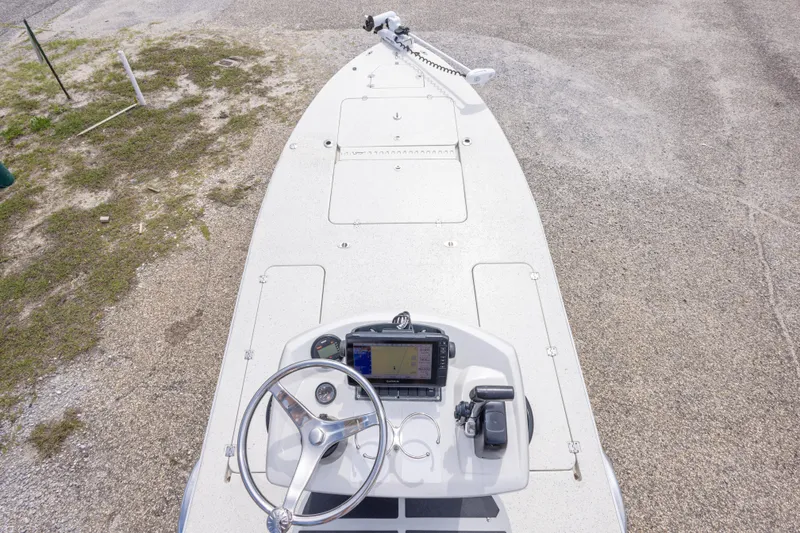 Slide: The Image of 2012 Young GulfShore 20 boat with steering wheel and navigation equipment on deck. - 34