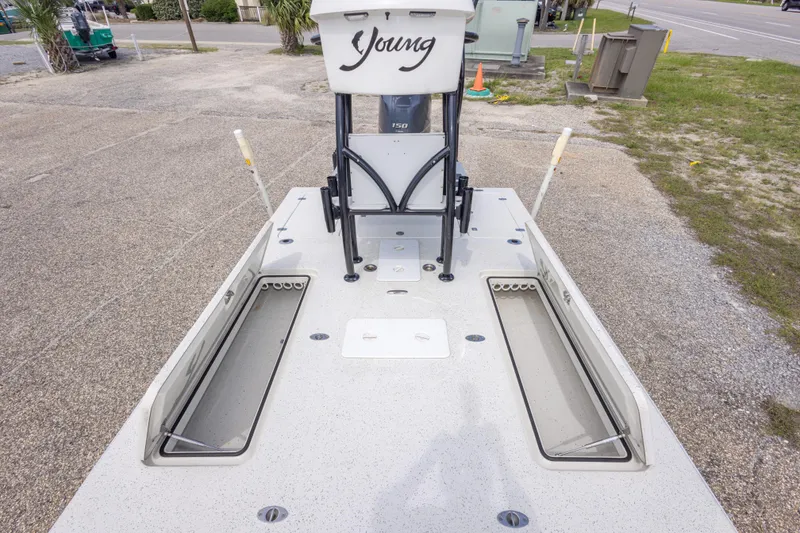 Slide: The Image of 2012 Young GulfShore 20 boat deck with storage compartments open. - 37