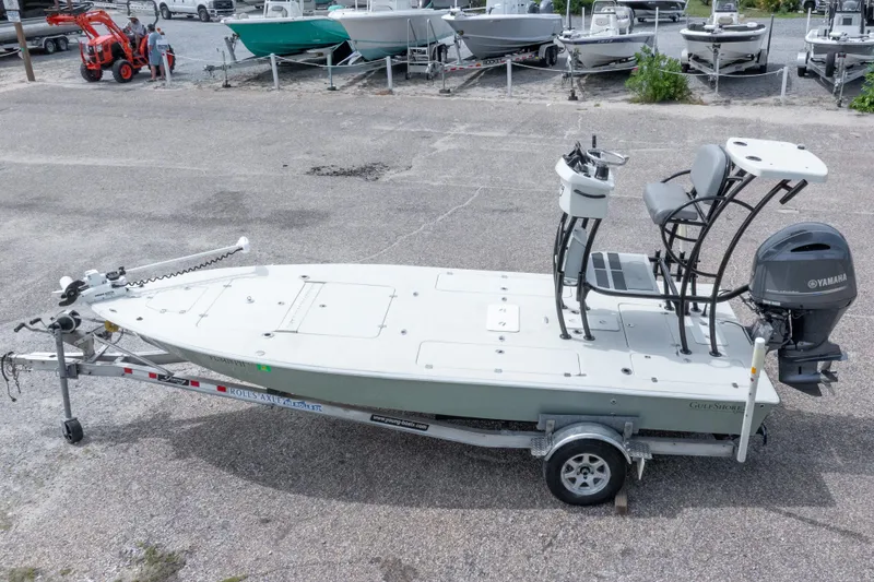 Slide: The Image of 2012 Young GulfShore 20 boat on trailer with Yamaha motor, parked in a lot. - 4