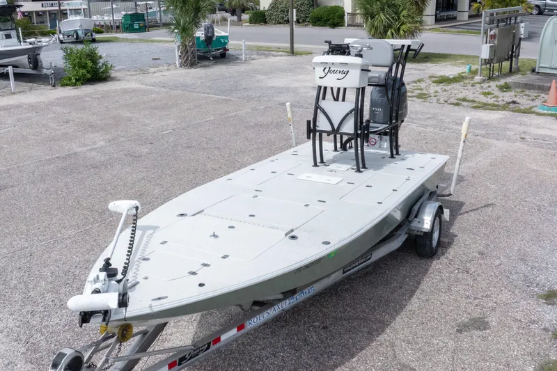 Slide: The Image of 2012 Young GulfShore 20 boat on trailer in parking lot. - 9