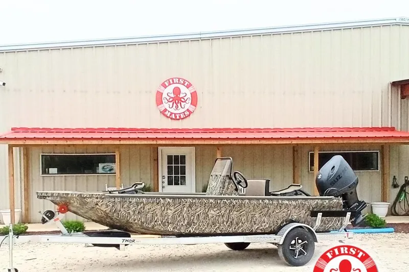 The Image of 2026 Thor 1900 Lake Hammer boat outside First Mates building with red roof. - 28