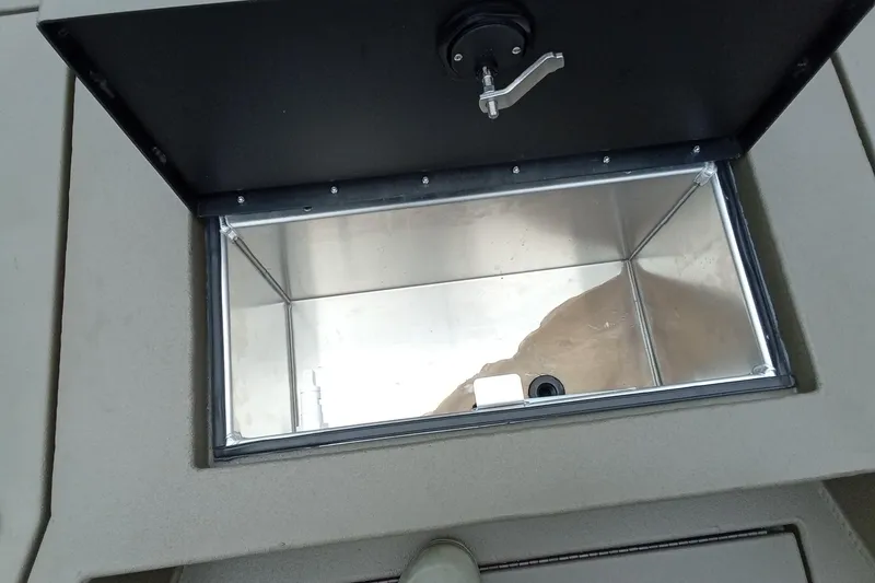 Slide: The Image of Open storage compartment in 2026 Thor 1900 Lake Hammer boat. - 43