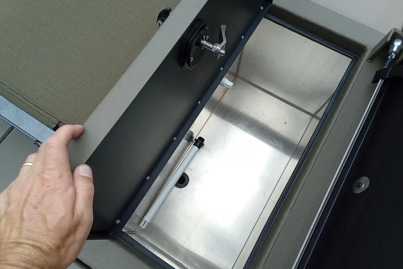 Slide: The Image of Open storage compartment in 2026 Thor 1900 Lake Hammer boat, showcasing interior details. - 46