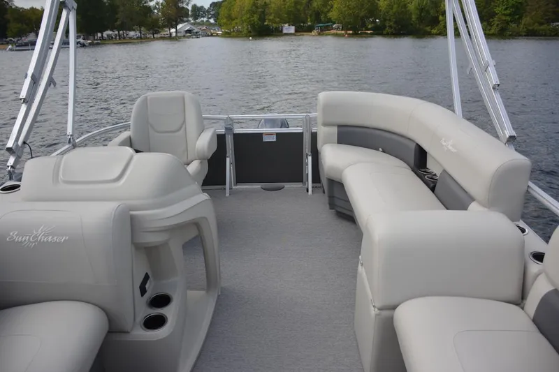 Slide: The Image of Manufacturer Provided Image: Interior of 2024 SunChaser Vista 18 LR pontoon boat on a lake. - 14