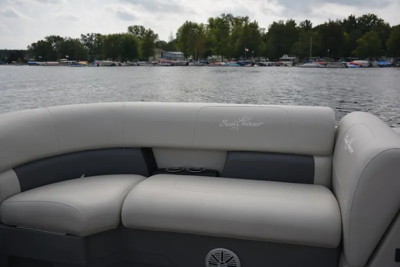 Slide: The Image of Manufacturer Provided Image: 2024 SunChaser Vista 18 LR pontoon boat interior with lake view. - 15