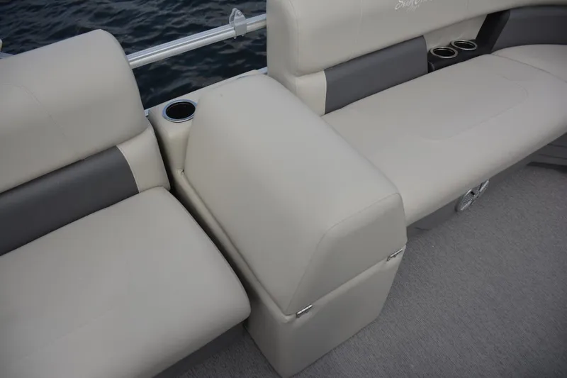 Slide: The Image of Manufacturer Provided Image: 2024 SunChaser Vista 18 LR boat interior with beige seating and cup holders. - 16