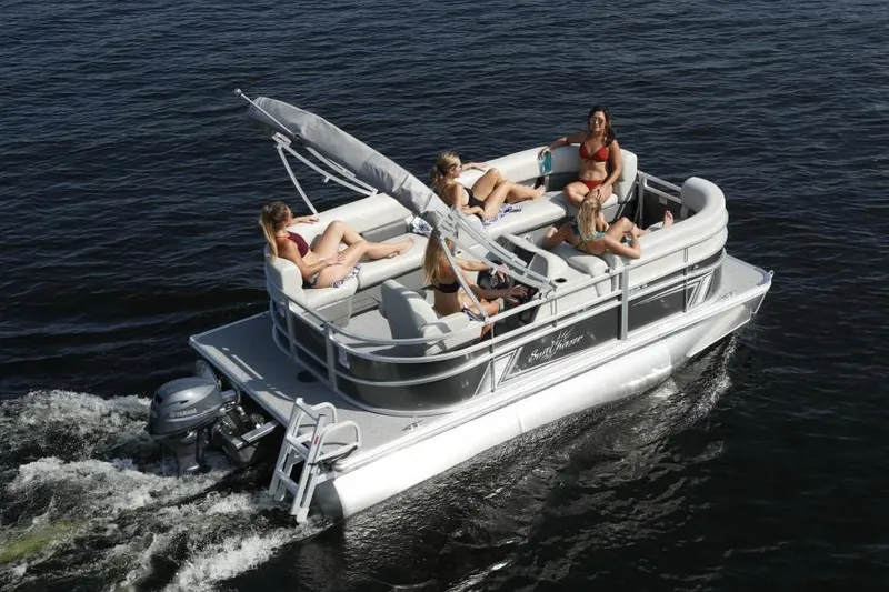 Slide: The Image of Manufacturer Provided Image: 2024 SunChaser Vista 18 LR pontoon boat with passengers enjoying a sunny day on the water. - 3