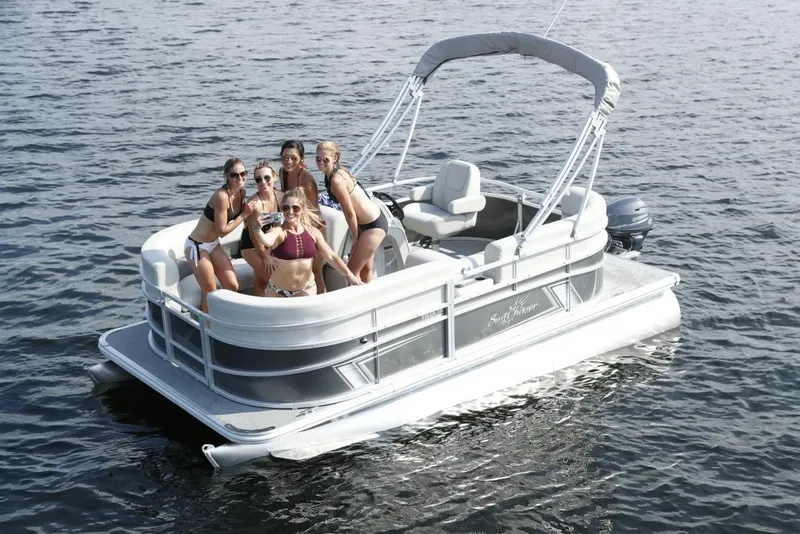 Slide: The Image of Manufacturer Provided Image: 2024 SunChaser Vista 18 LR pontoon boat with people enjoying on the water. - 4