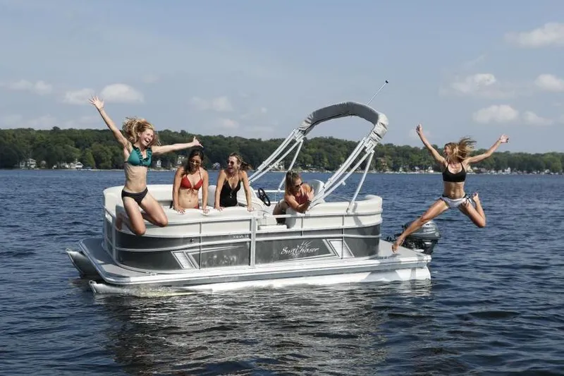 Slide: The Image of Manufacturer Provided Image: People enjoying on a 2024 SunChaser Vista 18 LR pontoon boat in a lake. - 6
