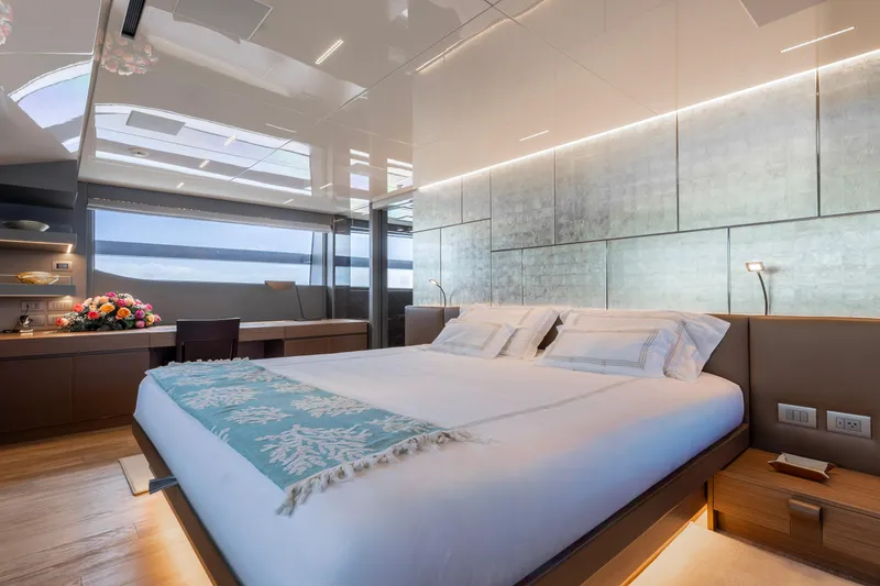 Slide: The Image of Luxurious bedroom interior on 2022 Sanlorenzo SL120A yacht with modern design and elegant decor. - 23