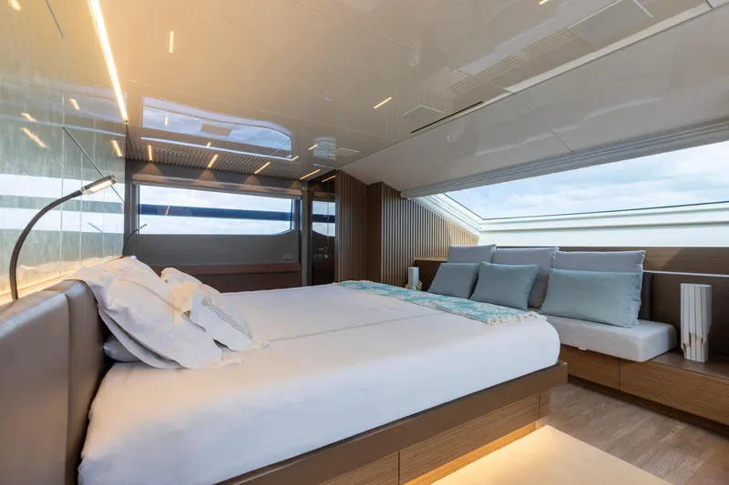 Slide: The Image of Luxurious bedroom interior of 2022 Sanlorenzo SL120A yacht with modern design and large windows. - 26